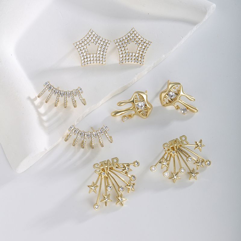 1 Paire XUPING Style Simple Irrégulier Géométrique Star Placage Incruster Le Cuivre Pierres Précieuses Artificielles Plaqué Or 18K Boucles D'Oreilles