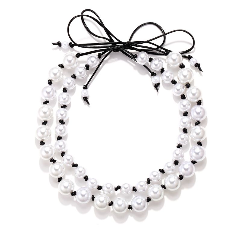 Großhandel Schmuck Elegant Einfacher Stil Runden Bogenknoten Imitationsperle Lederseil Perlen Halskette