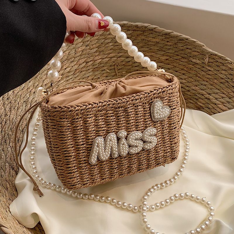 Women's Medium Straw Letter Solid Color Vacation Beach Beading Weave String Straw Bag