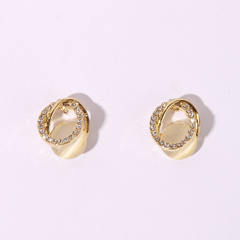 1 Pair Sweet Simple Style Shiny Oval Hollow Out Inlay Alloy Artificial Rhinestones Resin Gold Plated Ear Studs
