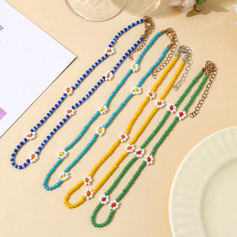 Großhandel Schmuck Ethnischer Stil Bohemien Gänseblümchen Saatperle Perlen Halskette