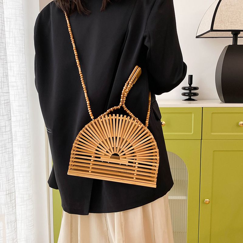 Women's Medium Bamboo Weaving Solid Color Vacation Classic Style Hollow Semicircle Magnetic Buckle Crossbody Bag