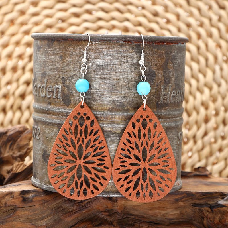1 Pair Vintage Style Ethnic Style Simple Style Water Droplets Beaded Hollow Out Wood Drop Earrings