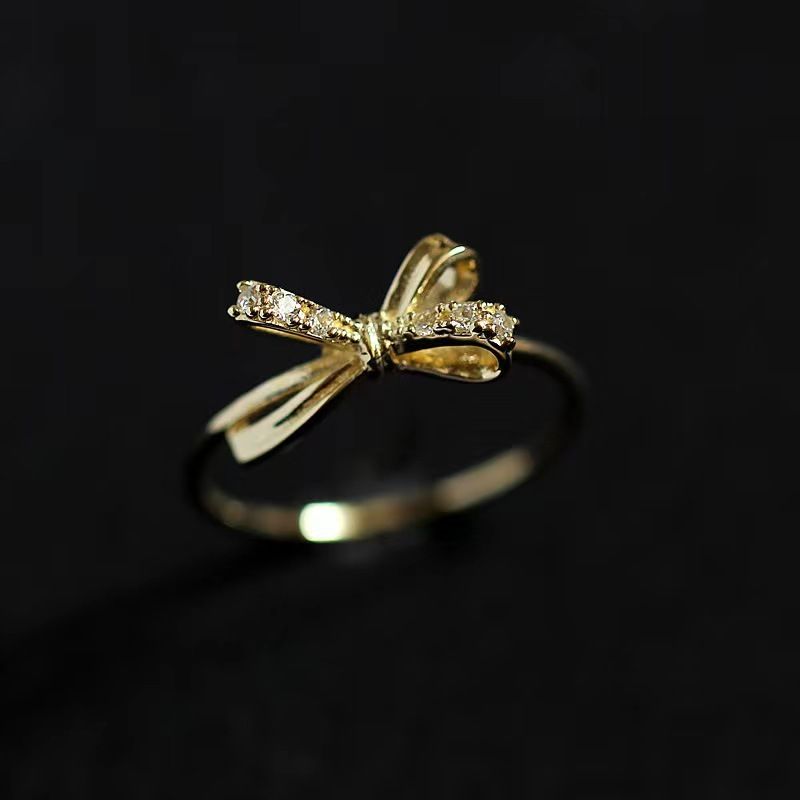 Wholesale Simple Style Classic Style Bow Knot Copper Plating Inlay Gold Plated Rhinestones Rings