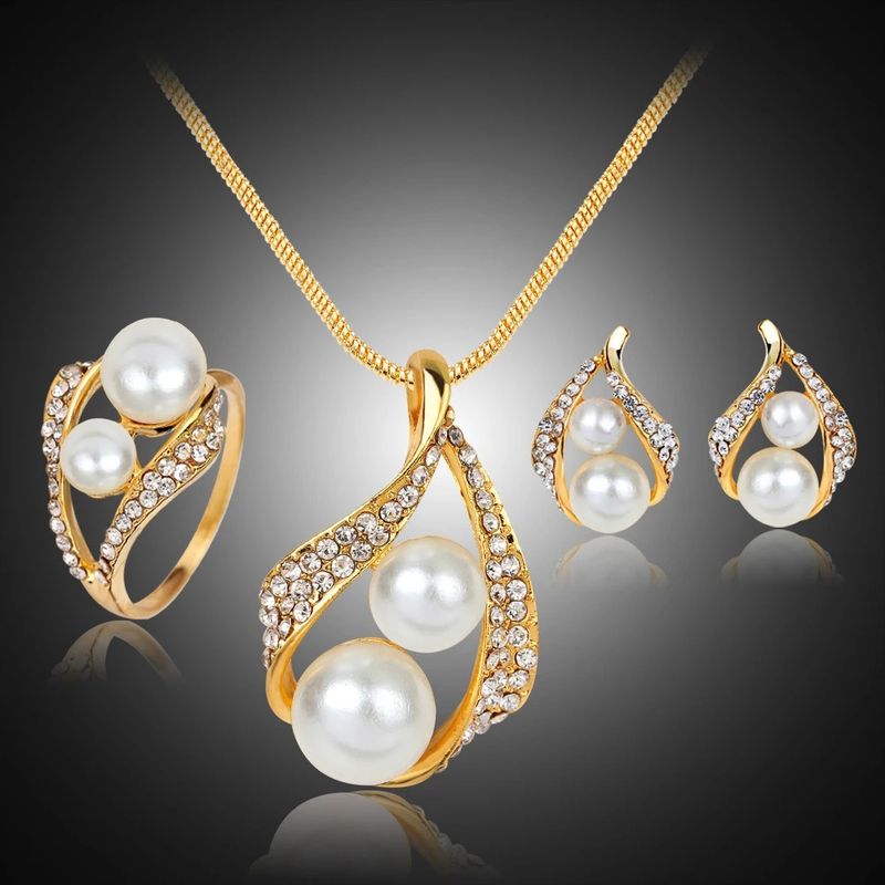 Lässig Hip Hop Luxuriös Geometrisch Herzform Krone Vergoldet Künstliche Perlen Kristall Legierung Großhandel Schmuck-Set