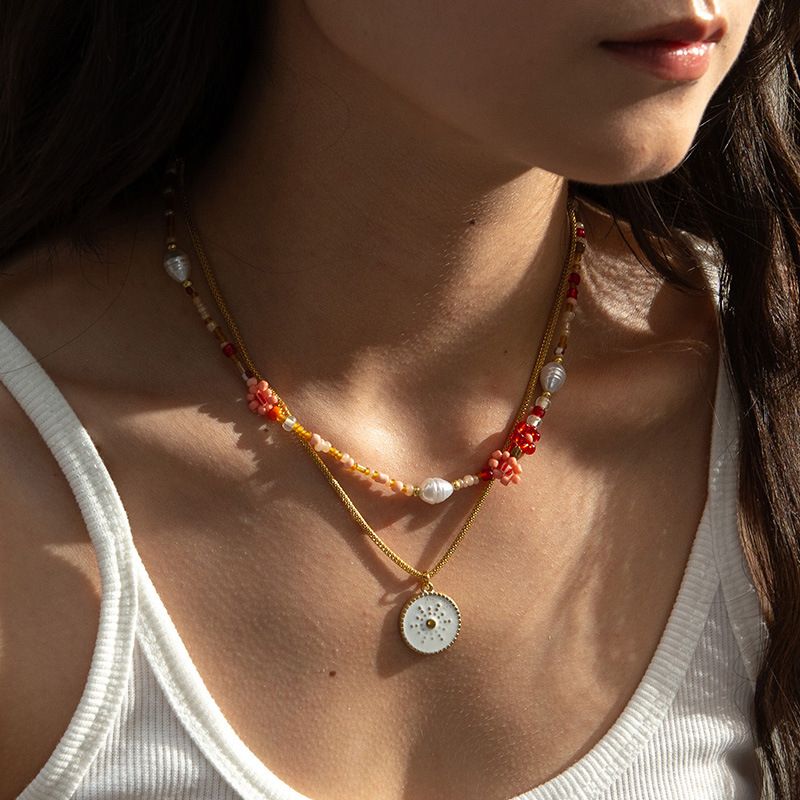 Einfacher Stil Klassischer Stil Blume Saatperle Titan Stahl Perlen Überzug Frau Geschichtete Halskette