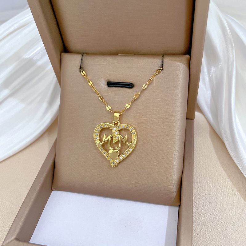 Großhandel MAMA Einfacher Stil Klassischer Stil Brief Herzform Titan Stahl Kupfer Aushöhlen Inlay Zirkon Halskette Mit Anhänger