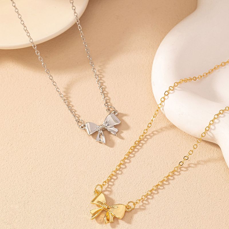 Wholesale Jewelry Simple Style Classic Style Bow Knot Iron Zinc Alloy Pendant Necklace