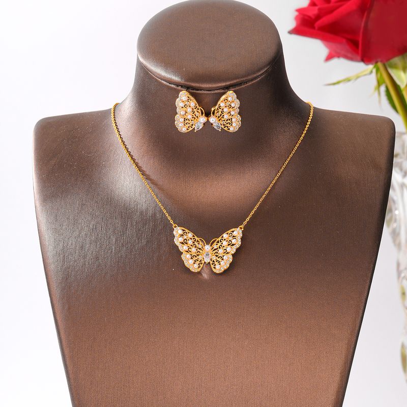Cobre Chapados en oro de 18k Elegante Señora Nupcial Embutido Mariposa Circón Aretes Collar