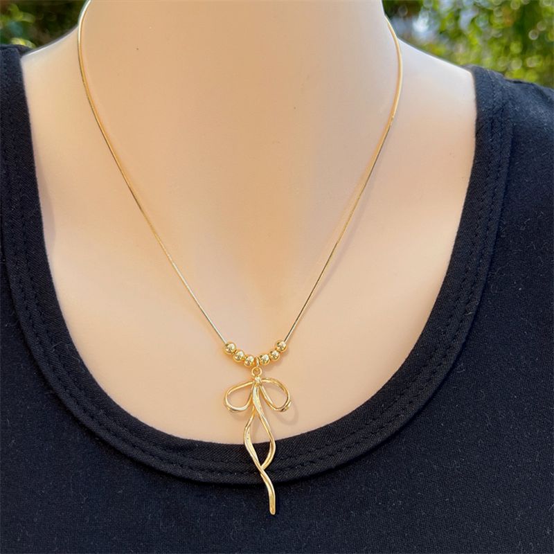 Copper 18K Gold Plated Simple Style Plating Bow Knot Pendant Necklace