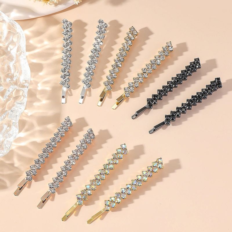 Mujeres Elegante Brillante Color Sólido Metal Embutido Diamantes De Imitación Pinza Para El Cabello