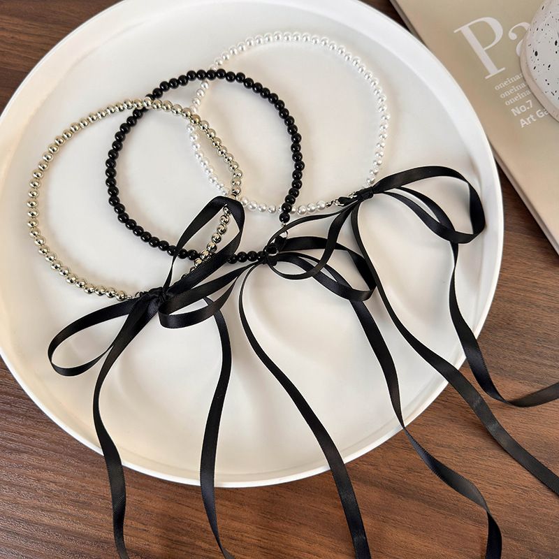 Großhandel Schmuck Elegant Glam Bogenknoten Imitationsperle Stoff Perlen Halsband