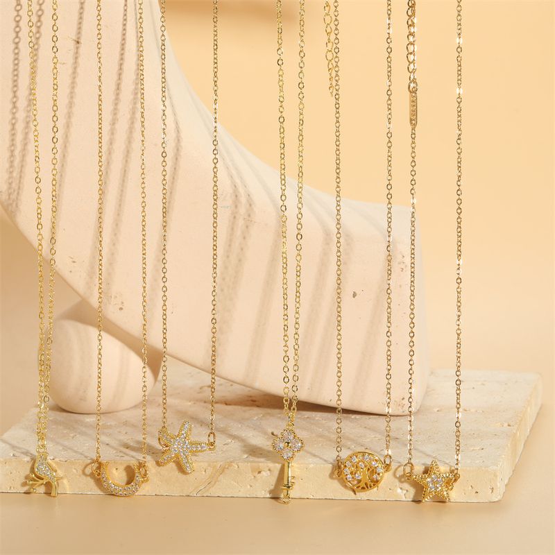 Einfacher Stil Strassenmode Mond Seestern Rostfreier Stahl Kupfer 14 Karat Vergoldet Zirkon Halskette Mit Anhänger In Masse
