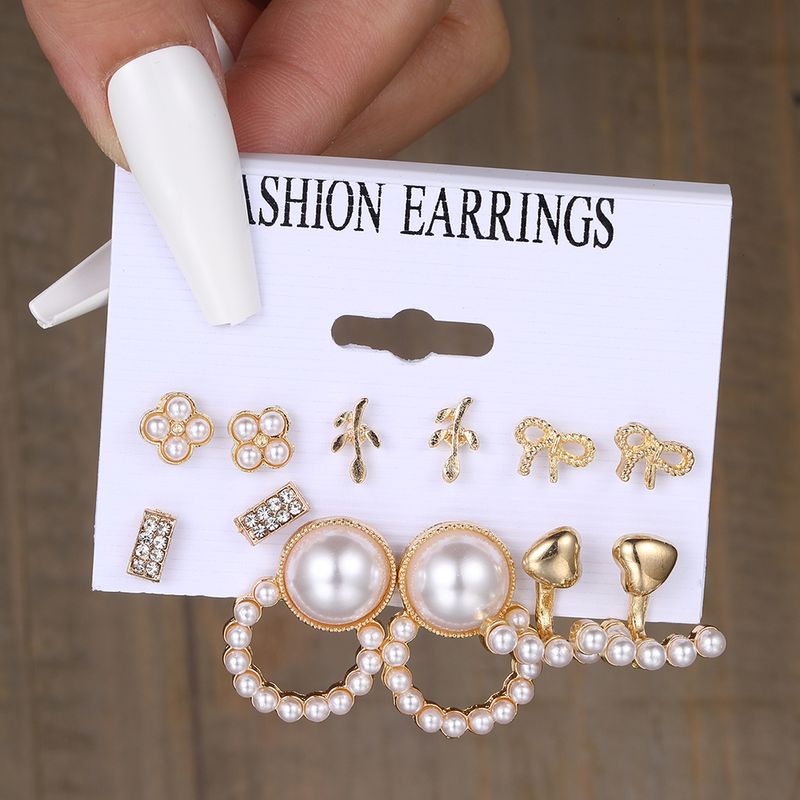 1 Set Casual Retro Heart Shape Bow Knot Inlay Alloy Artificial Pearls Earrings