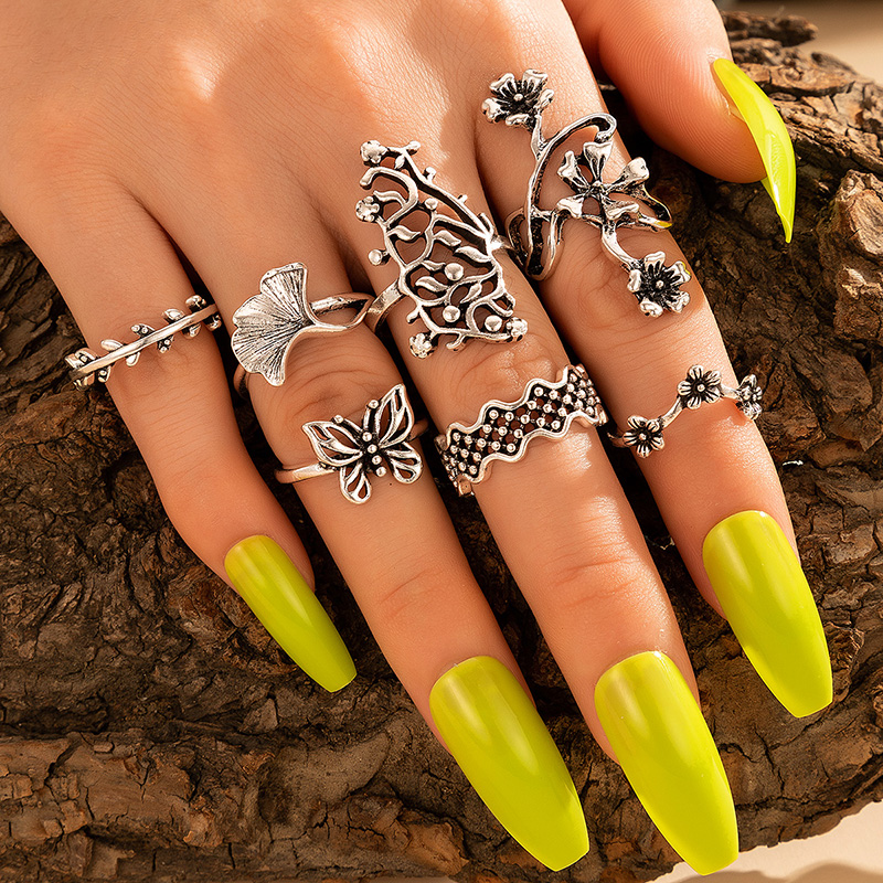 Creative Fashion Retro Alloy Hollow Flower Butterfly Joint Ring 7-piece Ring display picture 1