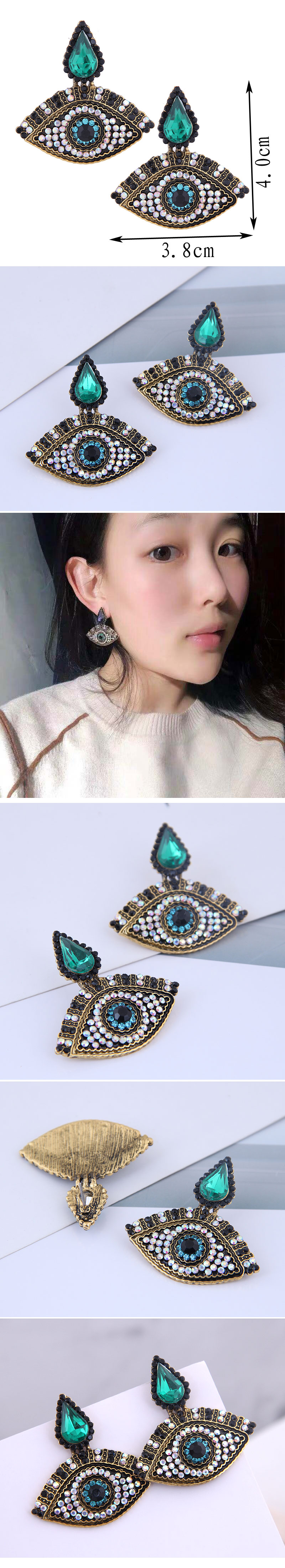 Fashion Metal Flash Diamond Demon Eye Exaggerated Earrings display picture 1