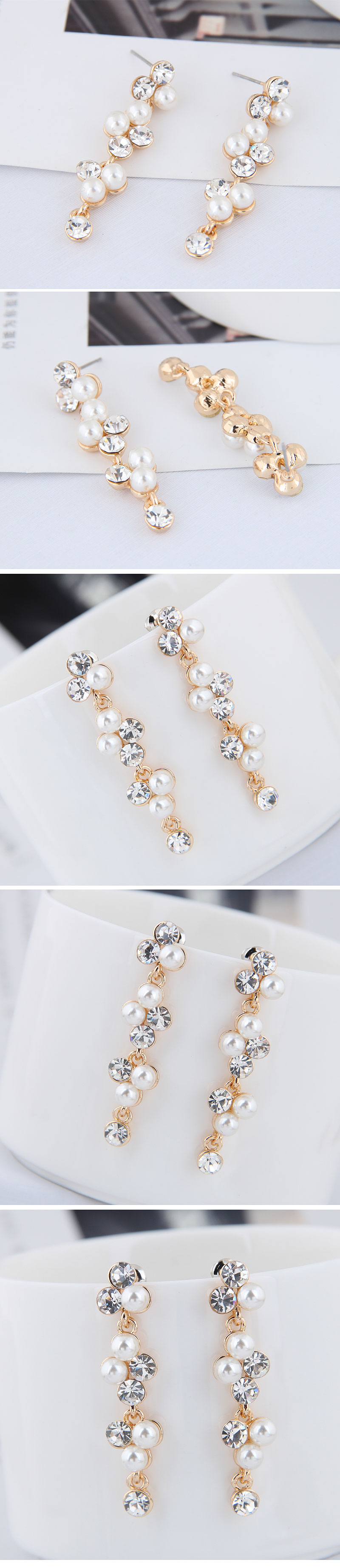 Korean Fashion Metal Sweet Wild Rhinestone Pearl Earrings Wholesale display picture 1