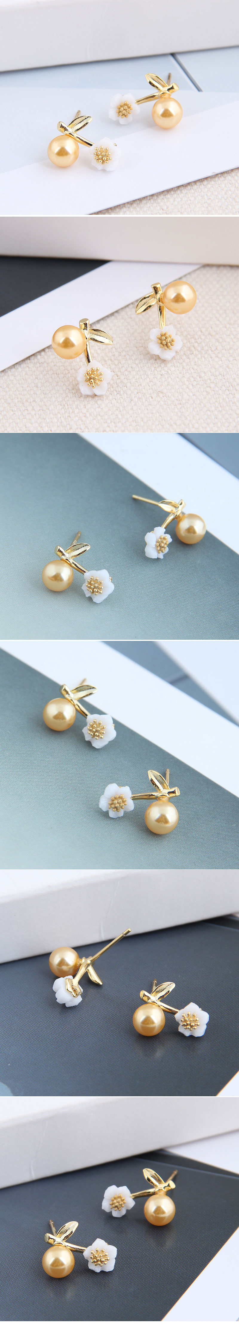 Korean Fashion Sweet Ol Wild Pearl Flower Copper Earrings Nihaojewelry display picture 1