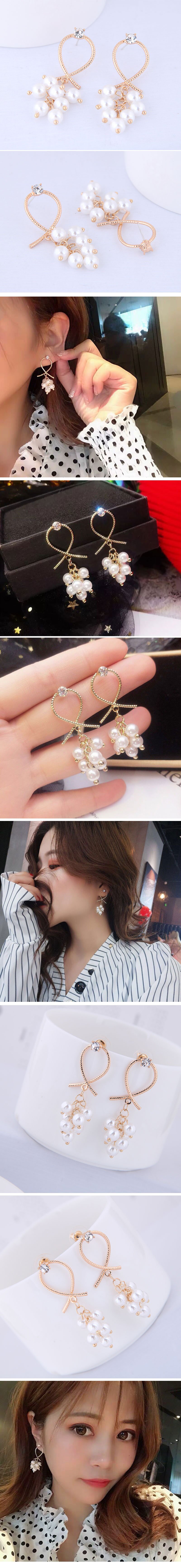 925 Silver Needle Korean Fashion Metal Knotted Sweet Elegant Pearl Alloy Earrings display picture 1