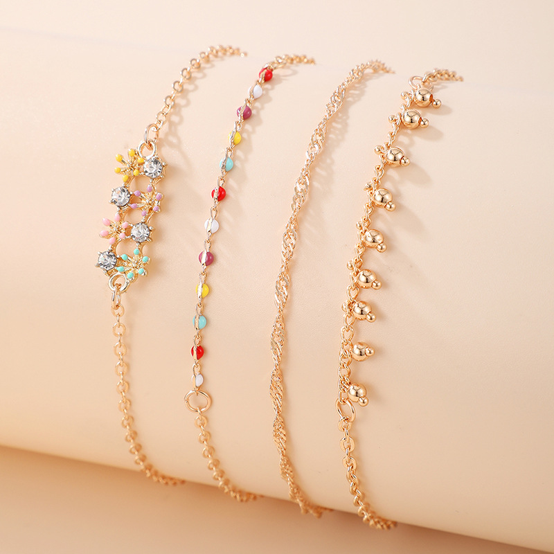 New Simple Trend Diamond-studded Color Drip Oil Flower Tassel Four-piece Bracelet display picture 4