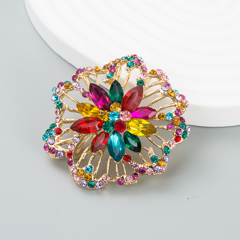 European And American Creative Fashion Color Rhinestone Alloy Hollow Flower Brooch display picture 4