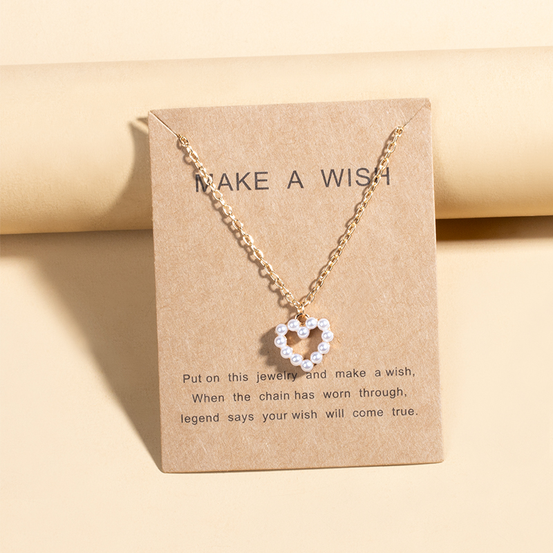 Einfacher Stil Herz Metall Künstliche Perlen Frau Halskette Mit Anhänger display picture 6