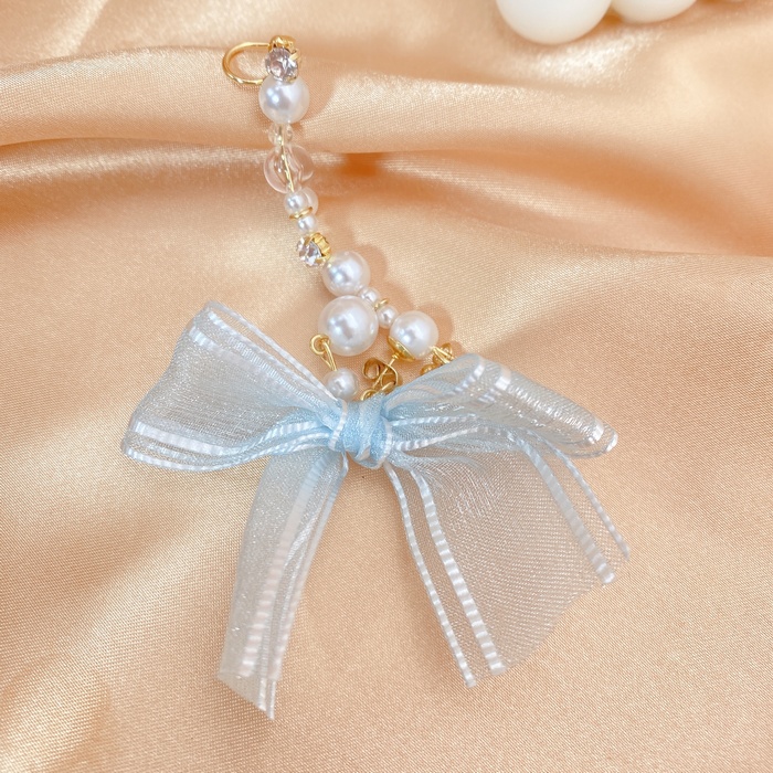 Korean Fashion New Pearl Bow Ear Clip Earrings display picture 2
