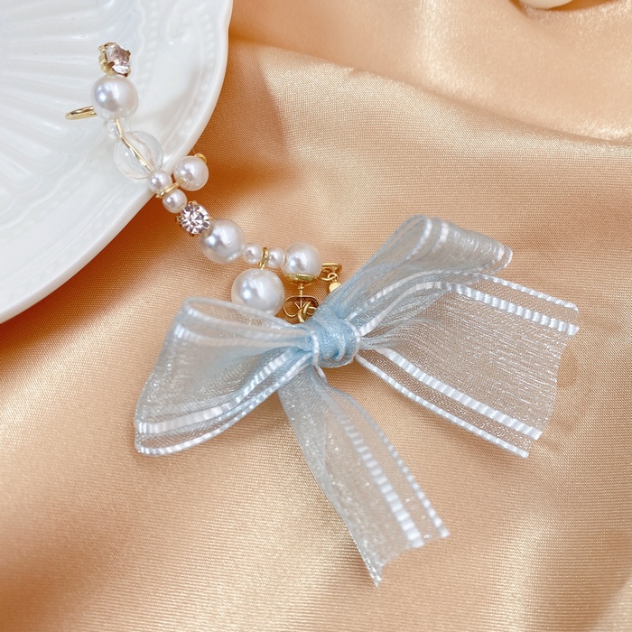 Korean Fashion New Pearl Bow Ear Clip Earrings display picture 4