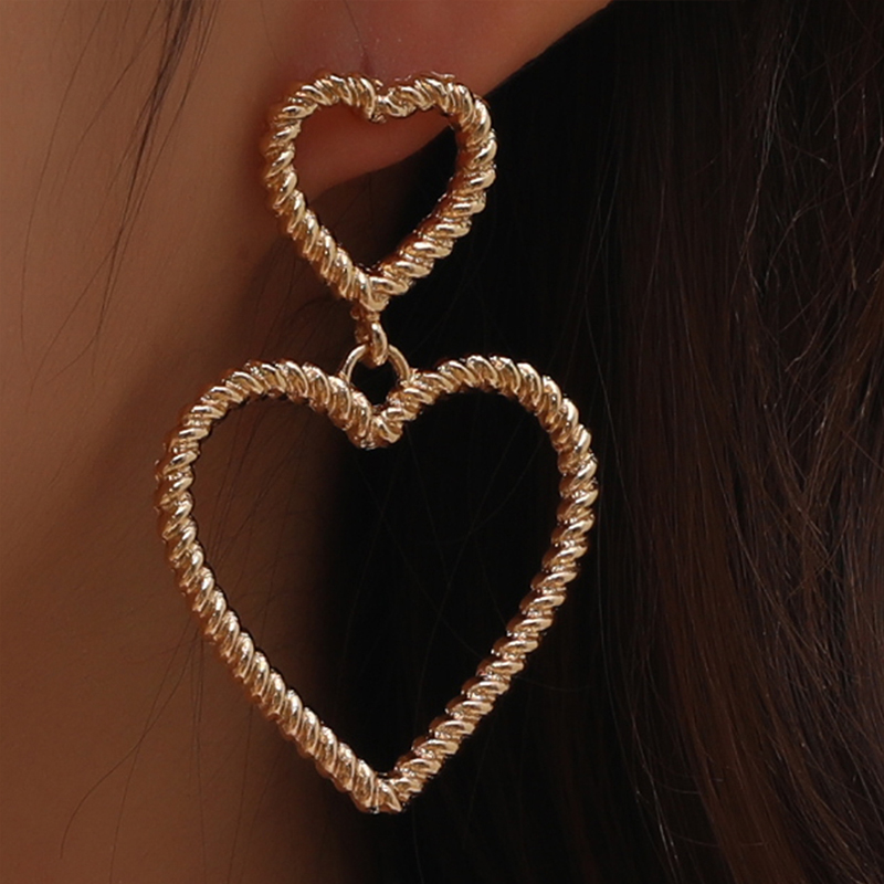 Double Heart Hollow Pendant Earrings display picture 1