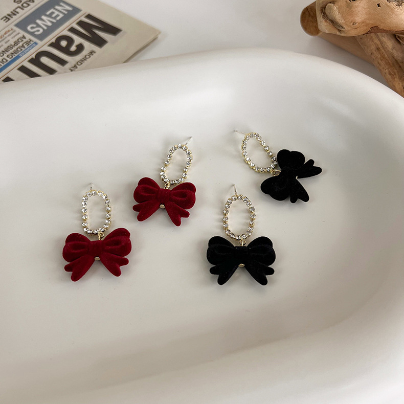 Full Diamond Super Flash Flocking Bow Earrings Wholesale display picture 2
