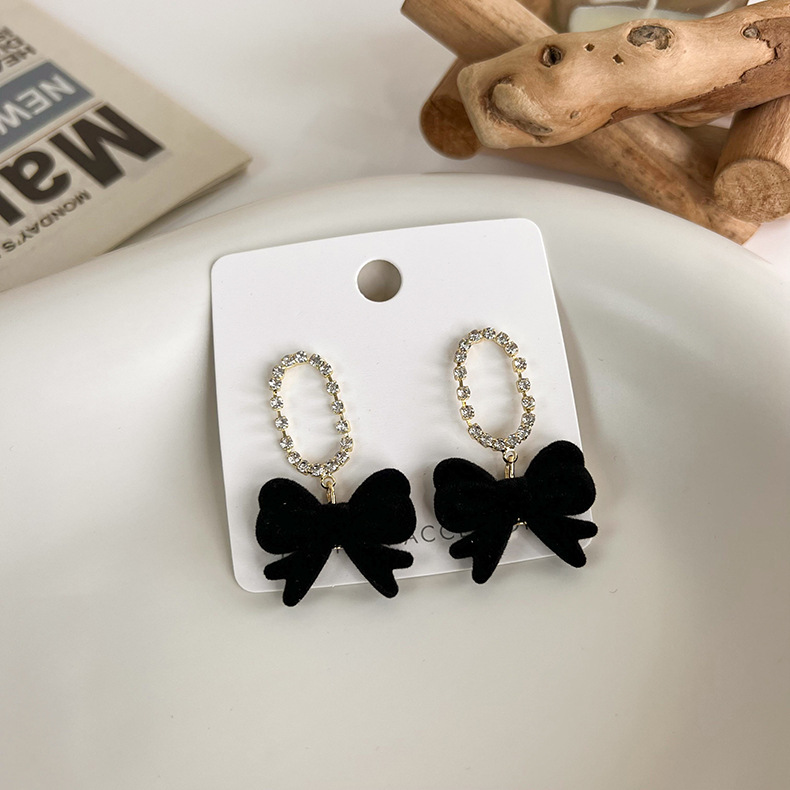 Full Diamond Super Flash Flocking Bow Earrings Wholesale display picture 4