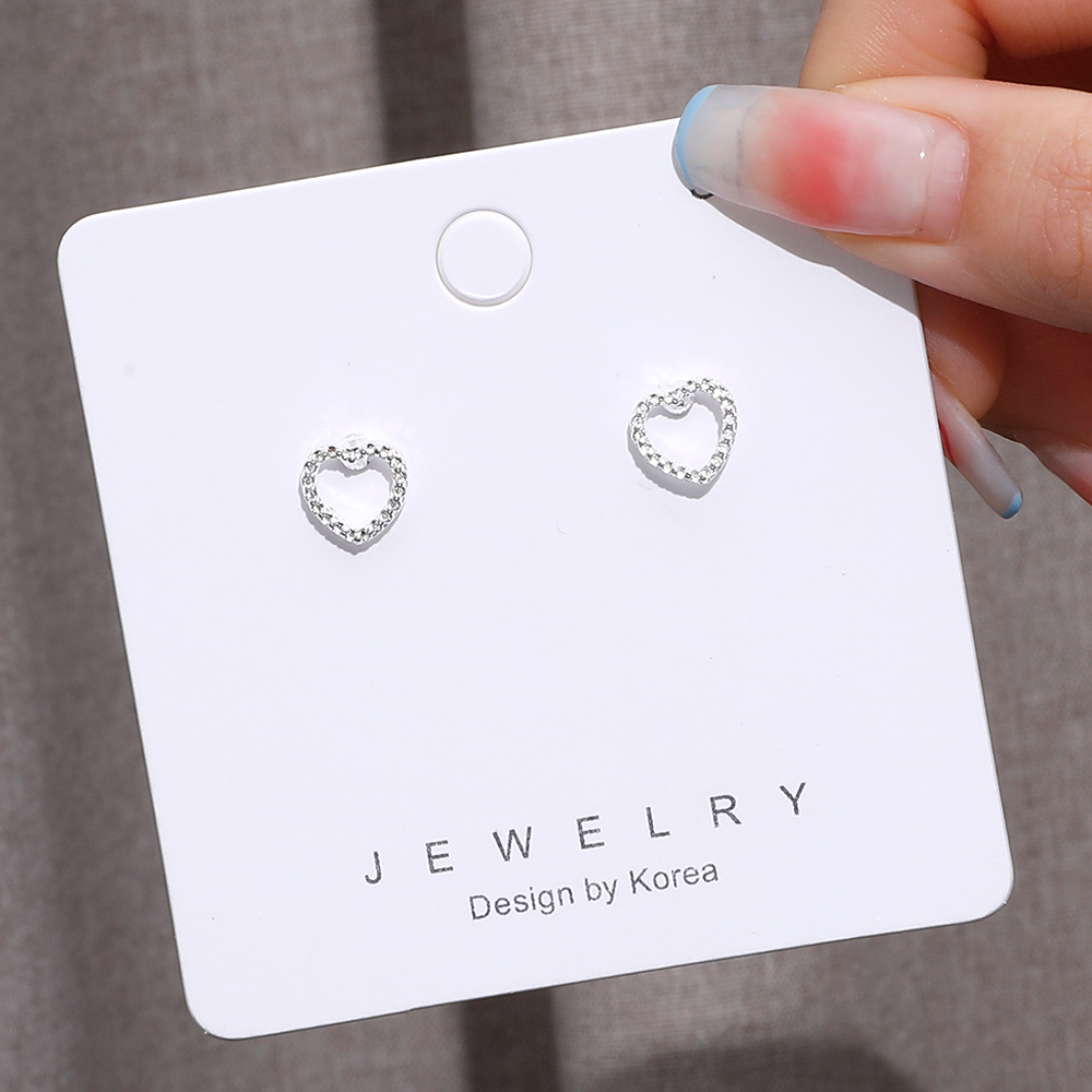 Fashion Hollow Heart-shaped Crystal Stud Earrings display picture 1