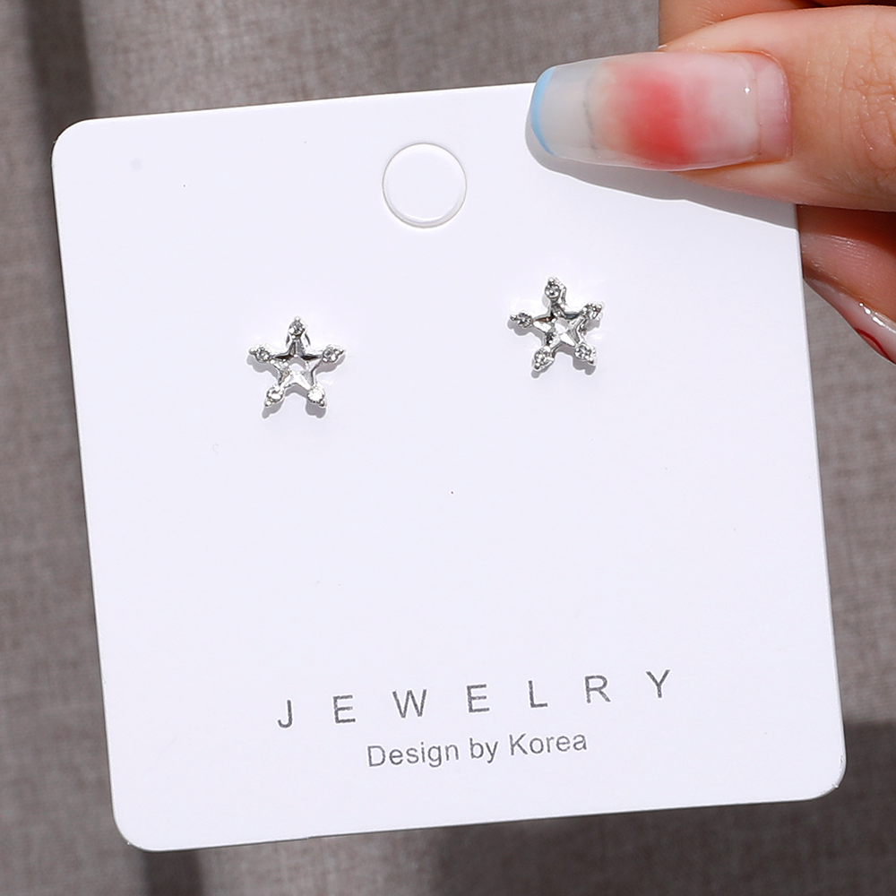 Exquisite Silver Hollow Star Earrings Wholesale display picture 2