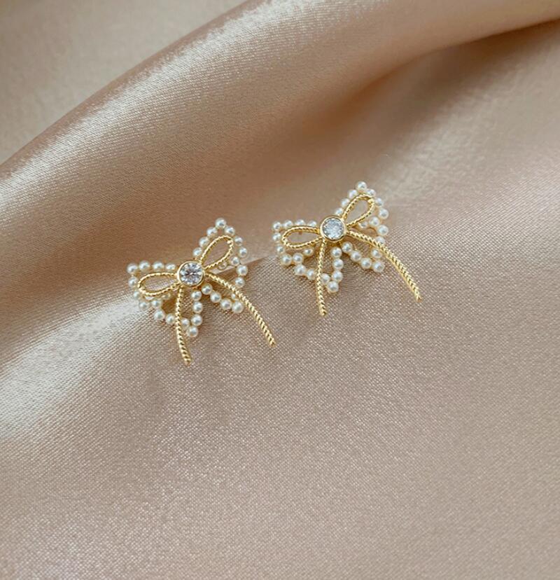 Fashion Bowknot Imitation Pearl Earrings display picture 1