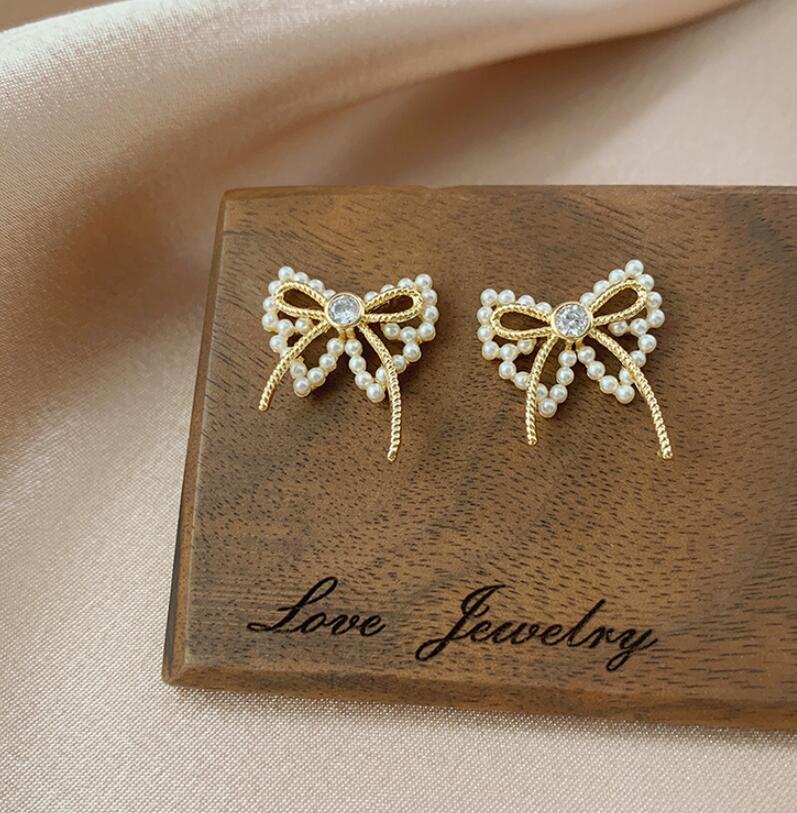 Fashion Bowknot Imitation Pearl Earrings display picture 2