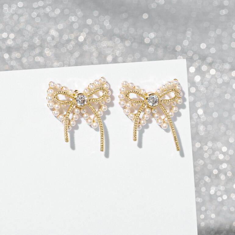 Fashion Bowknot Imitation Pearl Earrings display picture 3