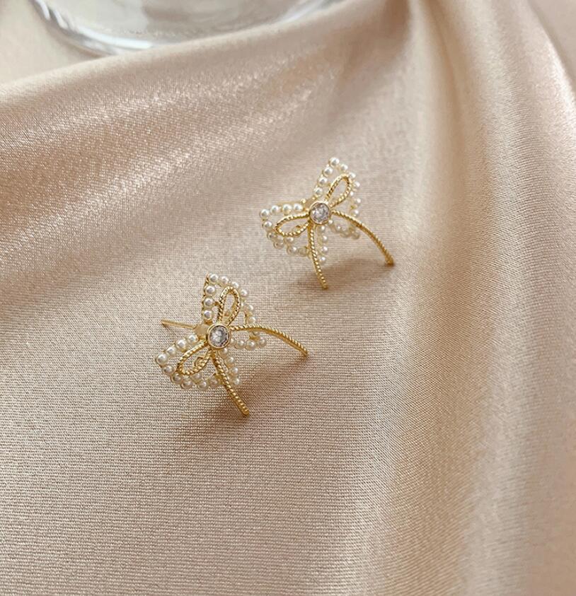 Fashion Bowknot Imitation Pearl Earrings display picture 4