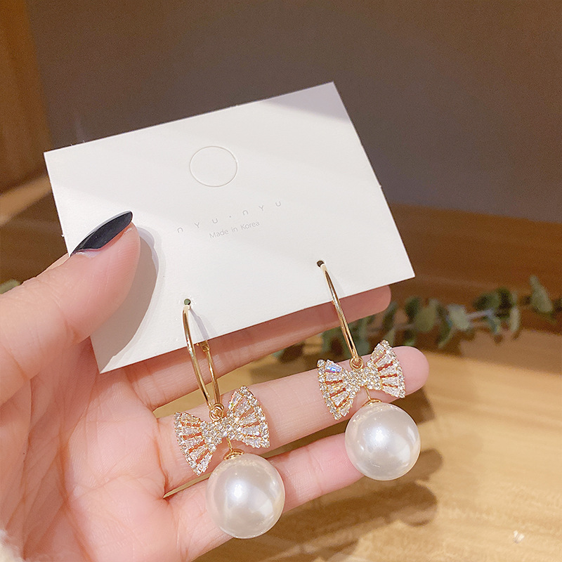 Fashion Pearl Zircon Bow Earrings display picture 3