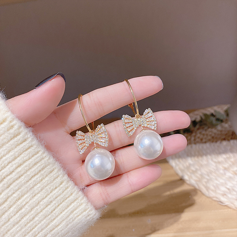 Fashion Pearl Zircon Bow Earrings display picture 4