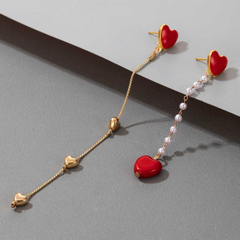 Korea Sweet Peach Heart Pearl Tassel Asymmetric Earrings display picture 1