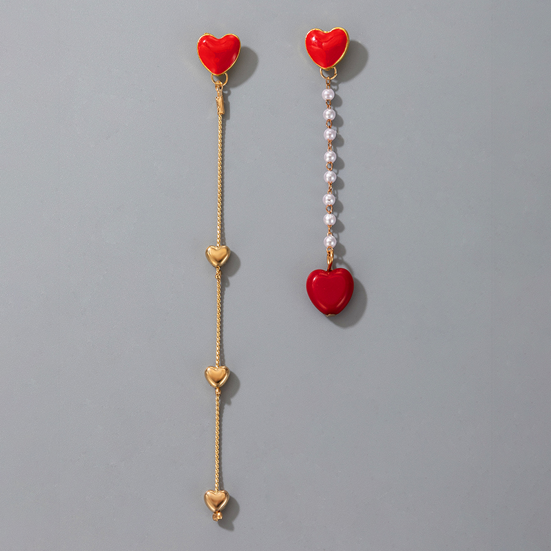 Korea Sweet Peach Heart Pearl Tassel Asymmetric Earrings display picture 2