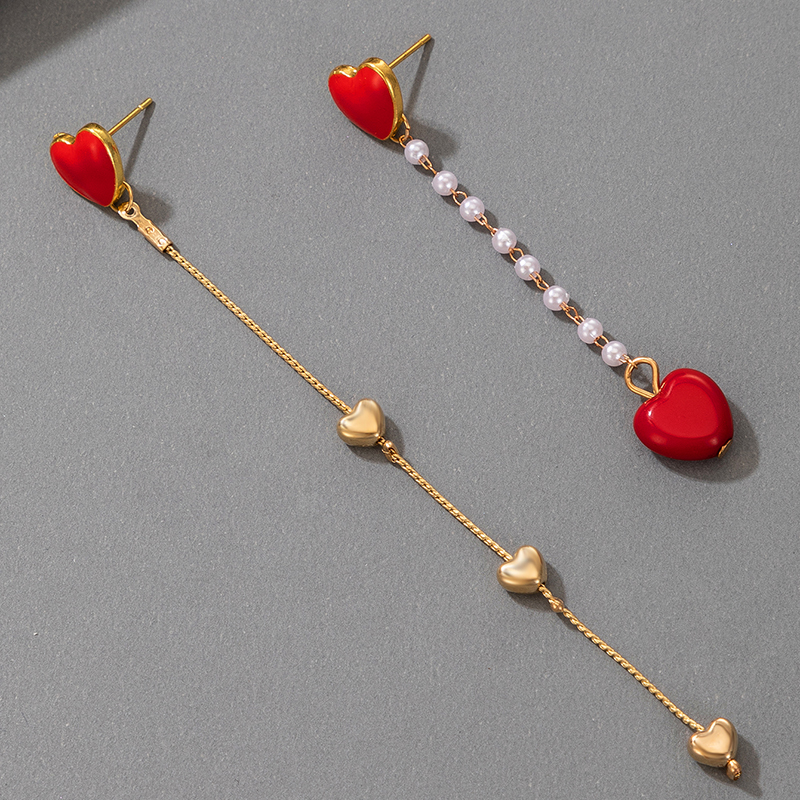Korea Sweet Peach Heart Pearl Tassel Asymmetric Earrings display picture 3