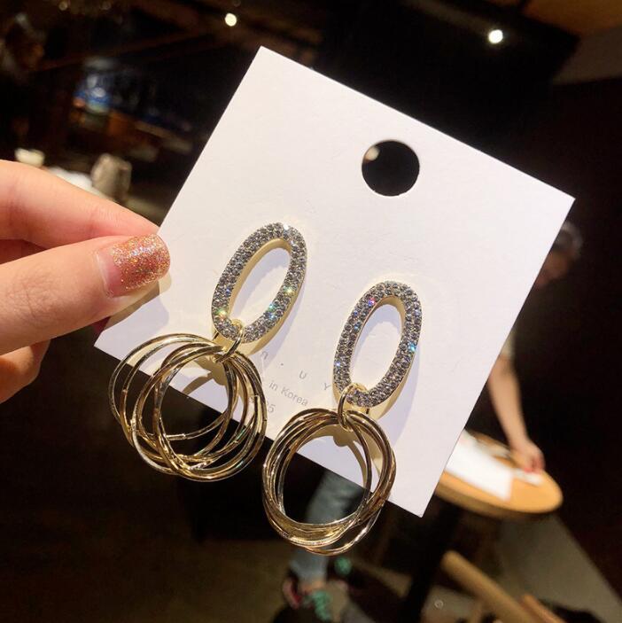 Gold Oval Hoop Earrings display picture 2