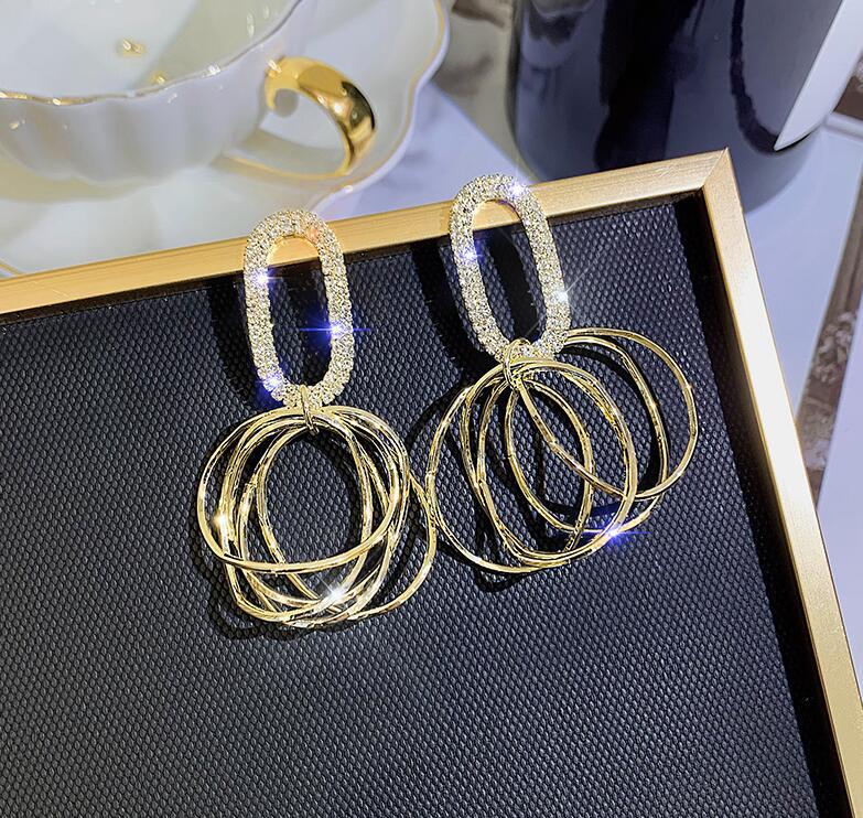 Gold Oval Hoop Earrings display picture 3