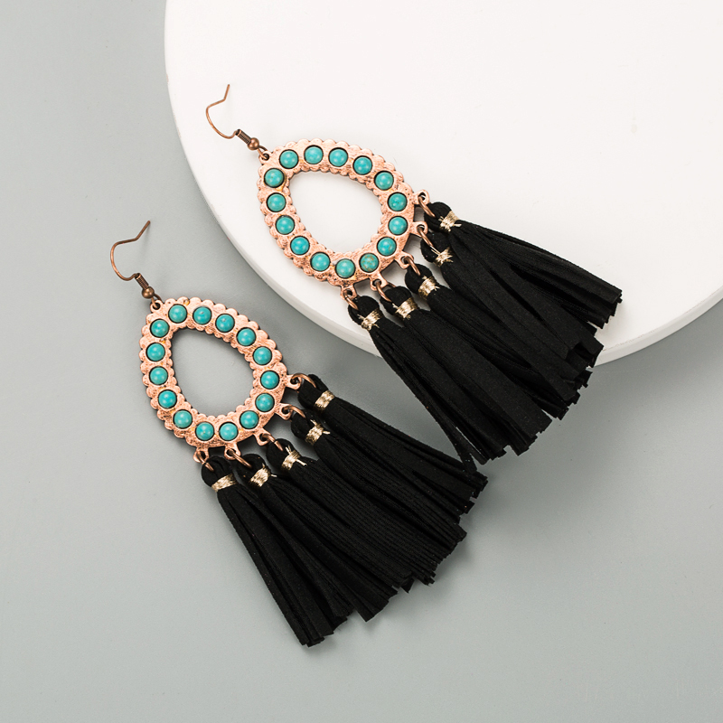 Creative New Exaggerated Leather Leopard Print Tassel Earrings display picture 4