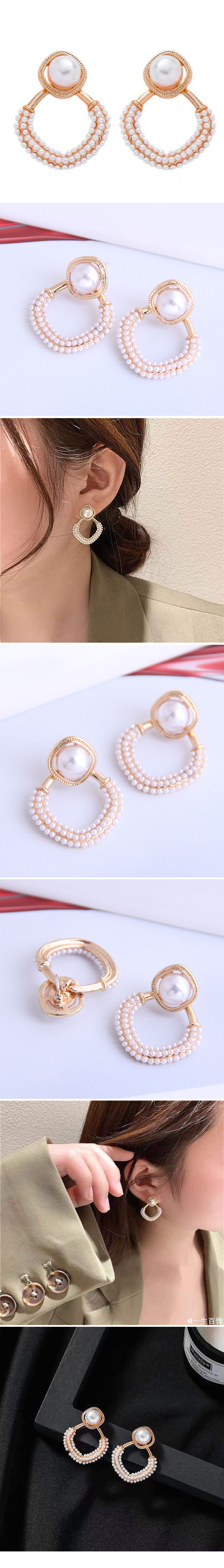 Korean Metal Concise Pearl Stud Earrings display picture 1