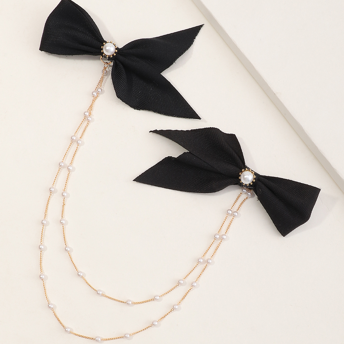 Fashion Korean New Style Simple Bowknot Double Chain Pearl Word Clip display picture 3