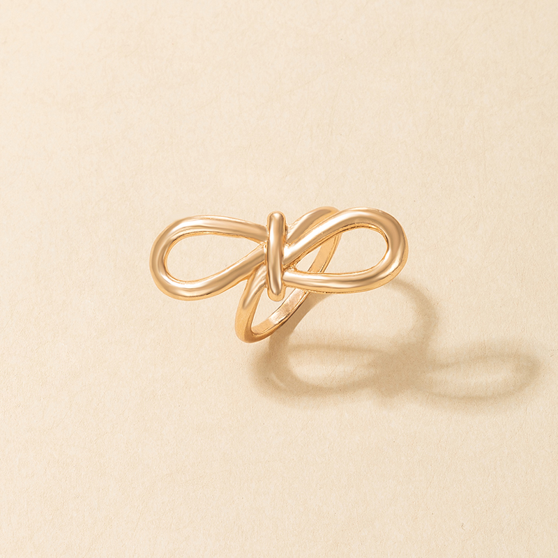 Fashion Golden Hollow Twist 8-shaped Knotted Ring display picture 2