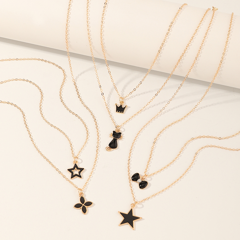 Simple Black Dripping Flower Five-pointed Star Crown Cat Pendant Necklace Set display picture 4