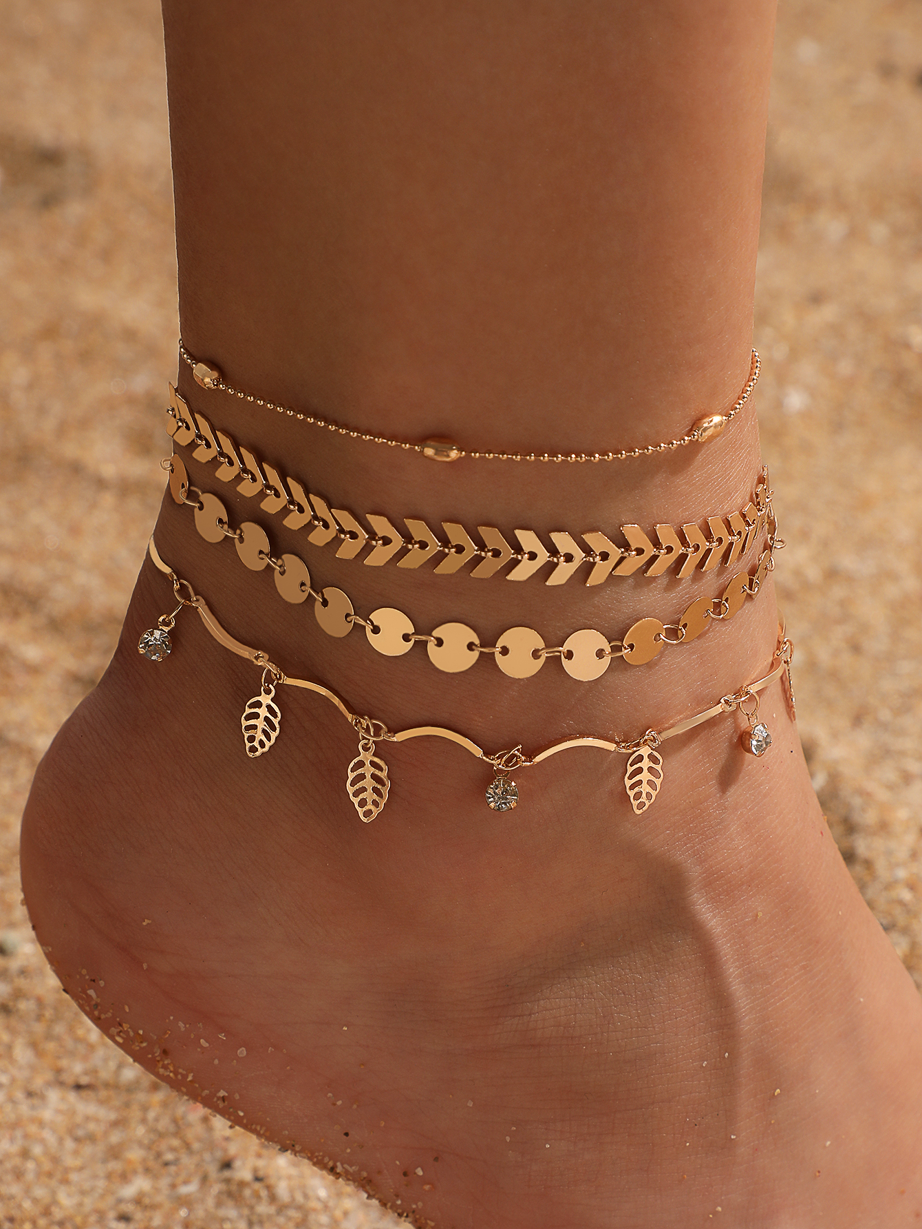 Wholesale Jewelry Geometric Triangle Arrow Hollow Leaf Anklet 4-piece Set Nihaojewelry display picture 1